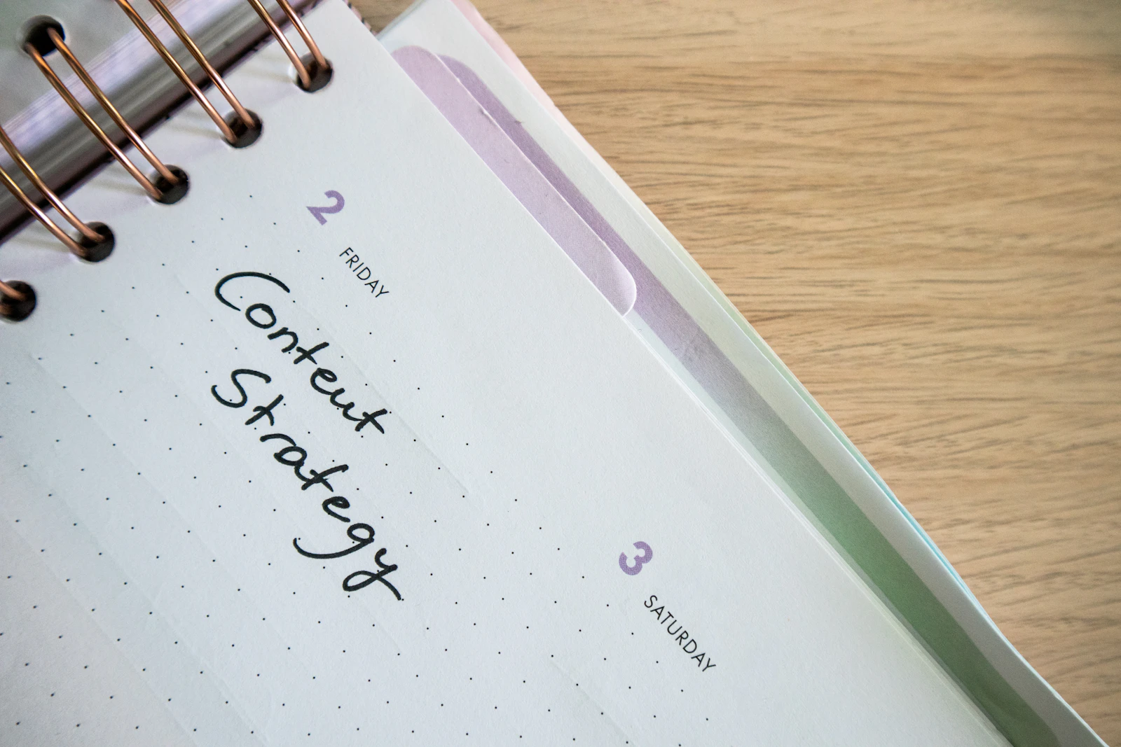 A content strategy notebook open on a desk.